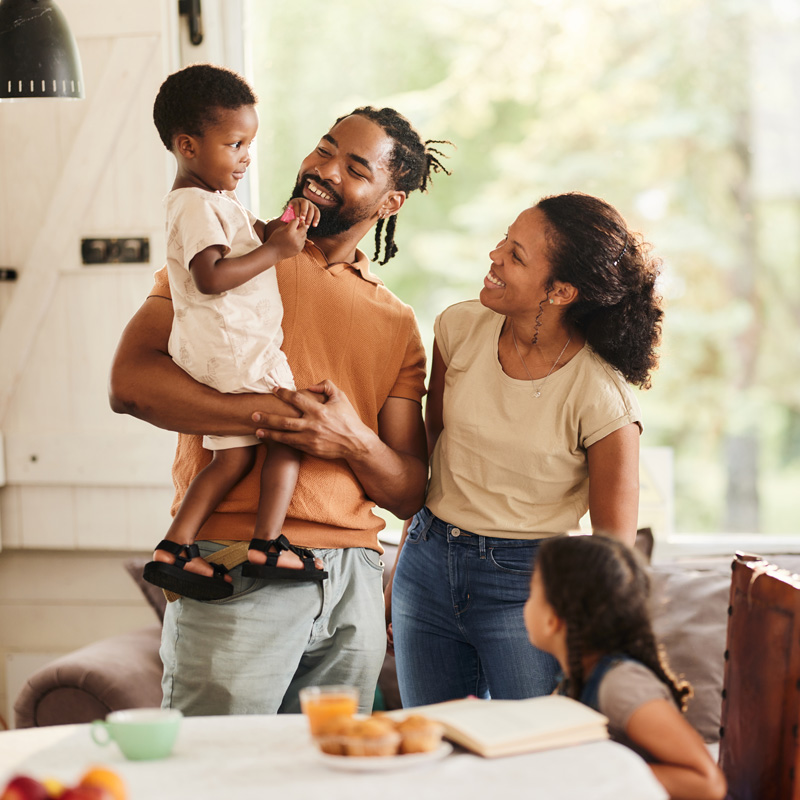 A family of four having a good time after breakfast in Houston, TX